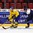 HELSINKI, FINLAND - JANUARY 2: Sweden's Jakob Forsbacka Karlsson #12 pulls the puck away from Slovakia's Ladislav Romancik #7 during quarterfinal round action at the 2016 IIHF World Junior Championship. (Photo by Matt Zambonin/HHOF-IIHF Images)

